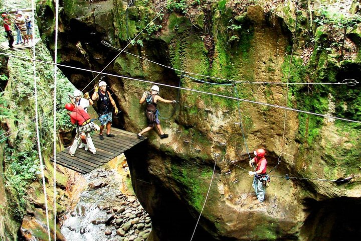 Ziplining in the canyon - Guachipelin Adventure Combo in Rincon de la Vieja Volcano - Native's Way Costa Rica Tours & Packages 